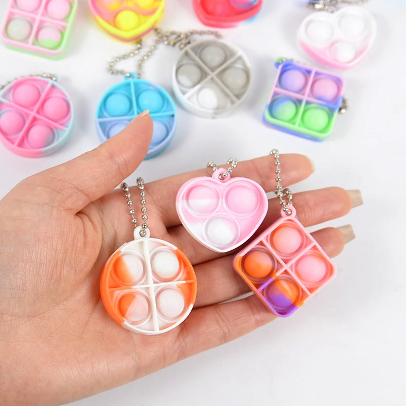 Brinquedo Pop It Portátil – Chaveiro Divertido e Anti-estresse